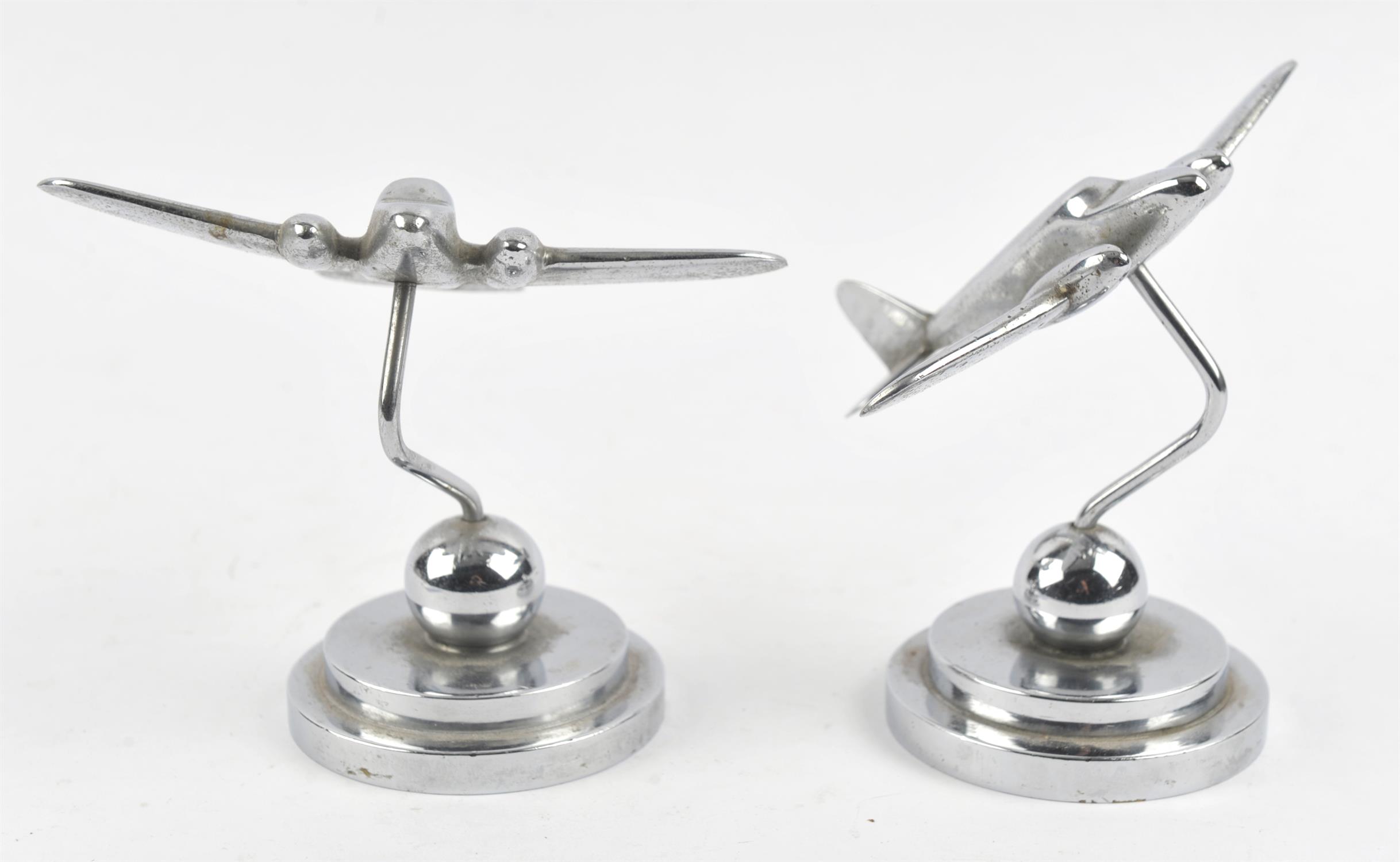 Pair of Art Deco aluminium desk ornaments cast as twin engine aircraft, on stepped base, - Image 2 of 2