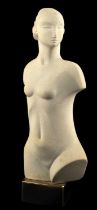 20th Century School, limestone torso of a girl, mounted on a polished bronze base, 44cm high