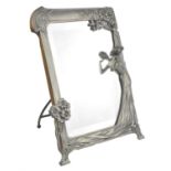 Art Noveau style pewter easel mirror ''The First Cuckoo'', with bevelled mirror and oak backboard,