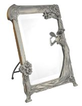 Art Noveau style pewter easel mirror ''The First Cuckoo'', with bevelled mirror and oak backboard,