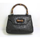 ADDENDUM LOT : GUCCI classic exotic-skin, bent-work bamboo top handle handbag, in black Ostrich