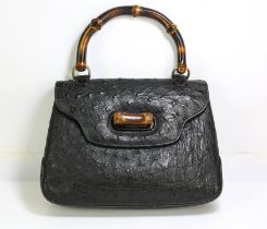 ADDENDUM LOT : GUCCI classic exotic-skin, bent-work bamboo top handle handbag, in black Ostrich
