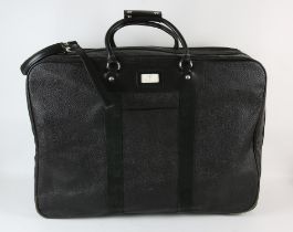 MULBERRY A black Scotchgrain leather and canvas suitcase on wheels with silver hardware,