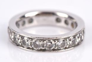 A diamond full eternity ring, set with round brilliant cut diamonds weighing an estimated total of