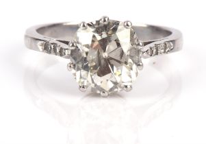 Single stone diamond ring, old cut diamond weighing an estimated 3.06 carats, with three single cut