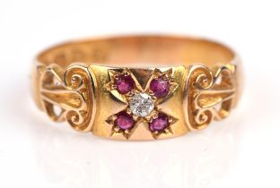 An antique ruby and diamond band ring, set in 18 ct gold, hallmarked Chester 1907, ring size O