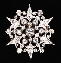 Diamond star brooch, set with old and rose cut diamonds, with a total estimated weight of 2.