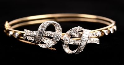 Diamond bow hinged bangle, set with round brilliant cut, single cut and baguette cut diamonds,