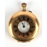18 ct gold half hunter pocket watch the unsigned white enamel dial with Roman numeral hour markers,