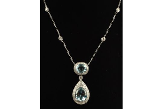 Aquamarine diamond pendant necklace, with oval cut aquamarine weighing an estimated 5.60 carats, - Image 2 of 2