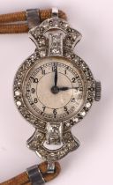 A Ladies' platinum and Diamond set cocktail watch, the diamond set bezel and lugs surmounting an