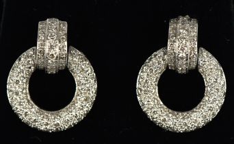 A pair of diamond earrings, round brilliant cut diamonds pave set in 18 ct gold, with post and