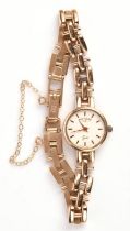 Ladies Rotary gold wristwatch, round white dial, with original box, case and bracelet in 9 ct