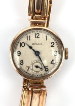 Rolex,A Ladies gold wristwatch the signed dial with Arabic numeral hour markers within a railway