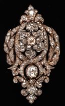 Victorian old cut diamond pendant brooch, with foliate, floral and scrollwork motifs with a total