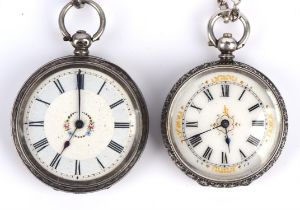 A Ladies Silver open face pocket watch with Roman numeral hour markers within folate gilt spandrels,