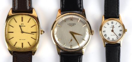 Longines A gentleman's gold wristwatch, the signed silvered dial,with Baton hour markers,