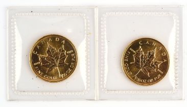 Two gold 1 Dollar Canadian coins