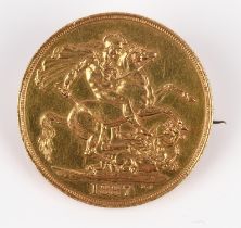 A double sovereign 1887, London mint, good but with one edge impact, converted to a brooch with