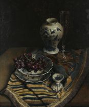 § Willem Dolphyn (Belgian 1935-2016). Still life of grapes, Delft pottery, a glass and a patterned