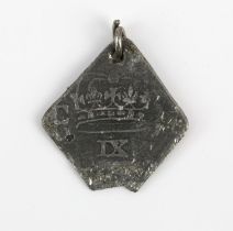 A British Newark siege nine pence, drilled with a jumper ring fitted, the lower corner chipped away,