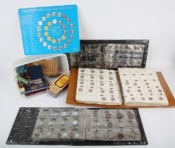 A large coin collection, including an album collection of British coins from circulation from