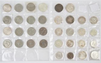 A coin collection of twelve (12) British cupronickel crowns dated between 1951 and 1981,