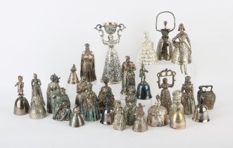 AMENDED DESCRIPTION A collection of 29 silver plated and white metal table bells,