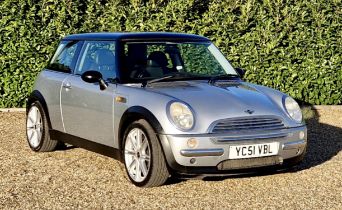 2001 Mini Cooper. Silver with black roof. Alloys and full Panoramic glass moonroof. 1.