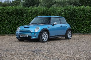 2003 Mini Cooper S. 1.6 litre. Metallic Laser-Blue with Blue/Black duo-tone leather upholstery,