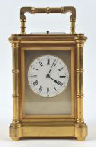 Brass carriage clock by Henri Jacot, the case with turned reel columns to the corners,