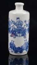 A Chinese porcelain snuff bottle of cylindrical form, decorated in underglaze blue and red with a