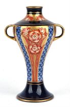 William Moorcroft (British, 1872 - 1945). Macintyre Aurelian ware baluster two handled vase,