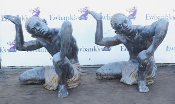 Pair of painted bronze console table bases, 20th Century, modelled as crouching moor figures,