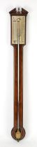 Mahogany stick barometer the silvered gauge inscribed Campione, Oxford, with chequered line inlay,