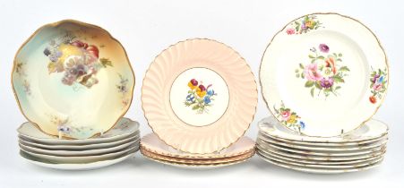 A group of porcelain/pottery side/dessert plates, to include a set of four floral decorated plates,