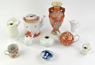 A Canton famille rose coffee can; two rouge-de-fer style teapots; a Guanyao style vase; a small