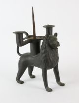 A bronze aquamanile, in the form of a lion, late 19th Century or later, converted to a pricket