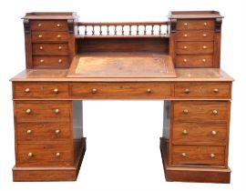 Victorian mahogany kneehole desk the top with a central writing slope with insert leather enclosed
