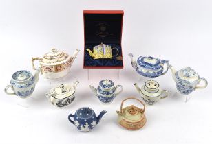 Eight English teapots including one by Royal Crown Derby, and one in the Italian Pattern blue and