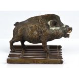 Continental bronze sculpture of a boar, late 19th Century, standing on a fence or gate, 8.5cm high