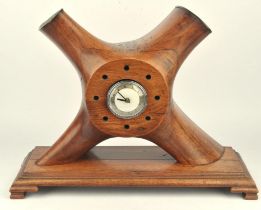 A English propeller wood clock, mid 20th century, with central removable Smith's glass faced clock,