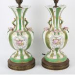 Pair of Louis XV style porcelain table lamps, of baluster form, with green, white and gilt stripes,