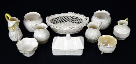 A Belleek Victorian style pieced basket, together with a collection of Belleek wares, various dates,