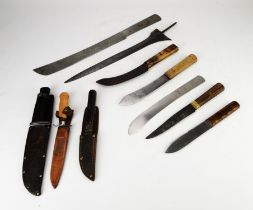 Steel kris blade, 19th century, 41.5cms long, together with six various knives with wooden hilts,