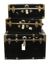 Pair of leather and brass studded trunks, 32cm high x 79cm wide x 42cm deep, together with a larger