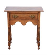 A small William and Mary style oak side table, mid 20th century, the moulded top with long drawer