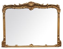 Victorian gilt wood and gesso over mantle mirror, the frame with foliate scroll work to the corners