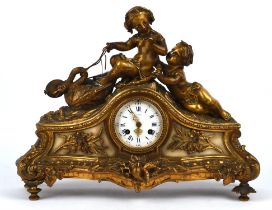 Farret a Paris, ormolu and white marble mantle clock the white enamel dial with blue Roman numerals,