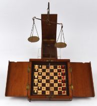 Victorian mahogany fold away travelling chess set, complete, with silver hallmarked plaque to front